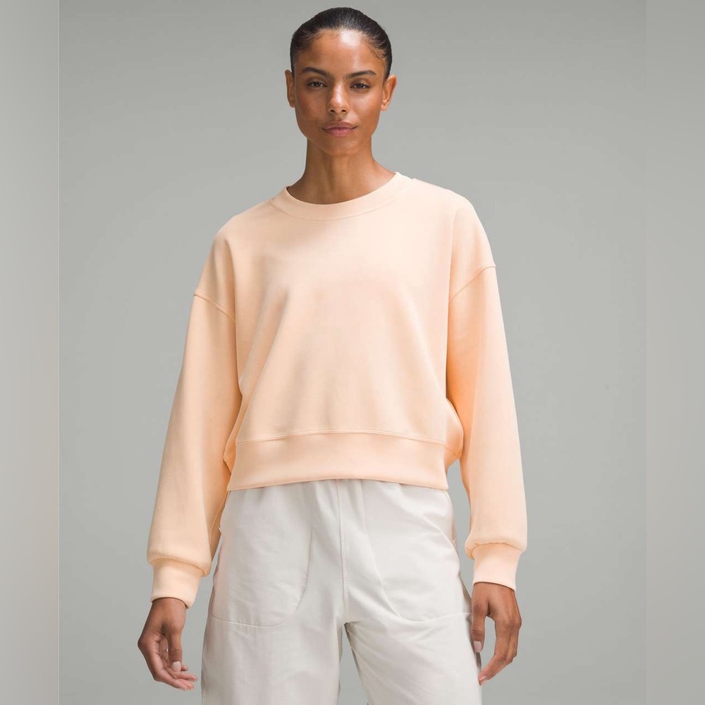 7. Lululemon Softstreme Perfectly Oversized Cropped Crew - Peach Bellini